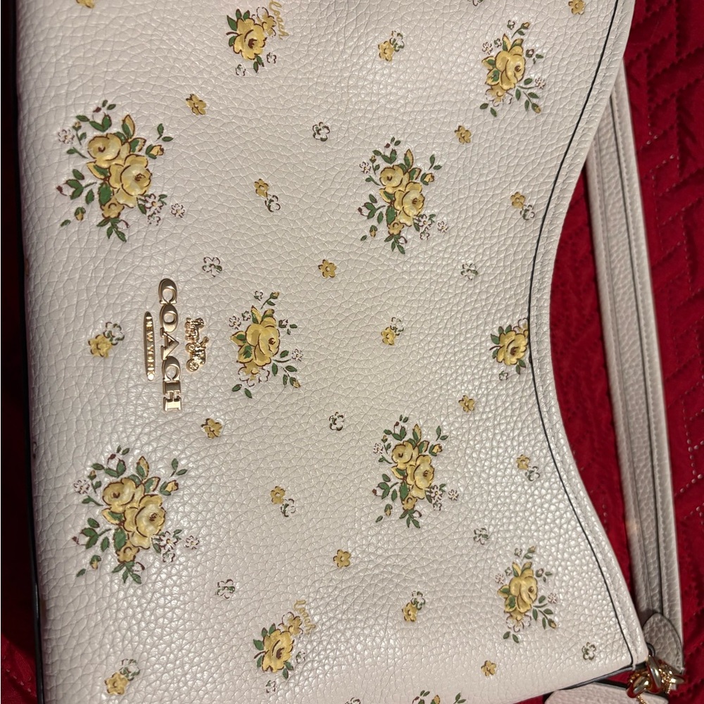 ***SOLD*** Coach White and Yellow Floral Clutch